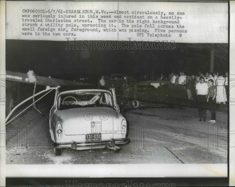 Load image into Gallery viewer, 1961 Press Photo Car Crushed by Fallen Utility Pole, Charleston West Virginia
