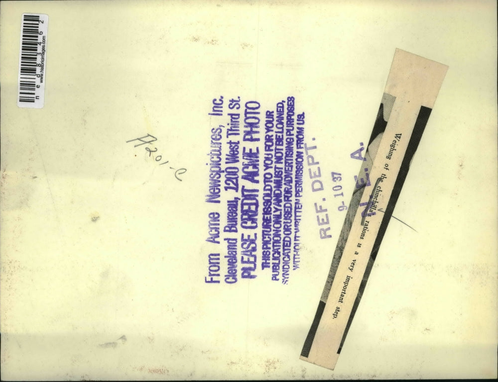 1937 Press Photo A man weighing a chinchillas food rations at his farm