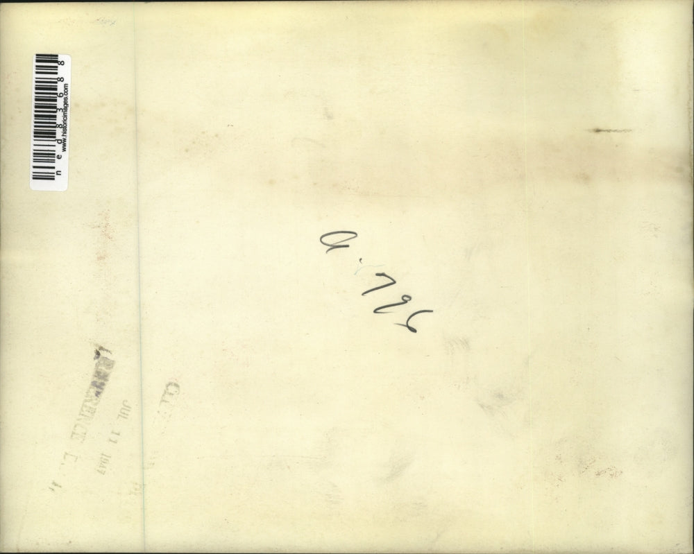 1947 Press Photo Striking employees of Remington Band across street of plant