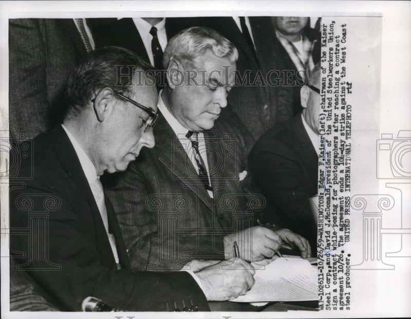 Load image into Gallery viewer, 1959 Press Photo L-R Edgar Kaiser and David McDonald in a contract agreement
