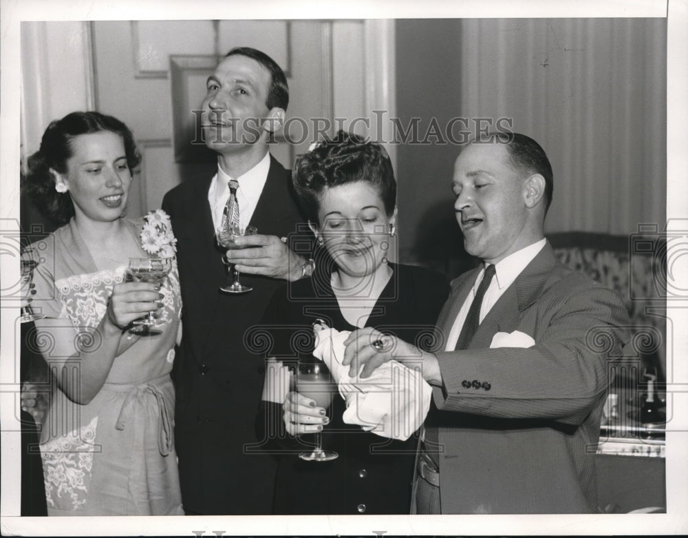 1946 Press Photo John Bukaty at Champagne victory Club Party