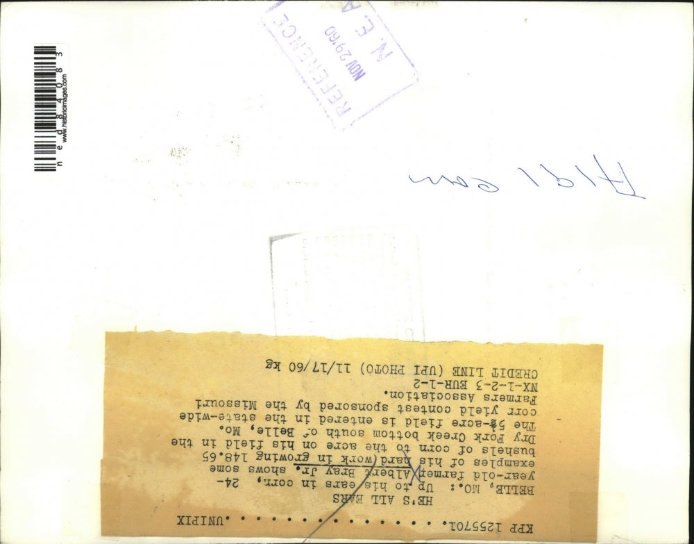 1960 Press Photo Albert Bray Jr., farmer, shows some examples of his hardwork in