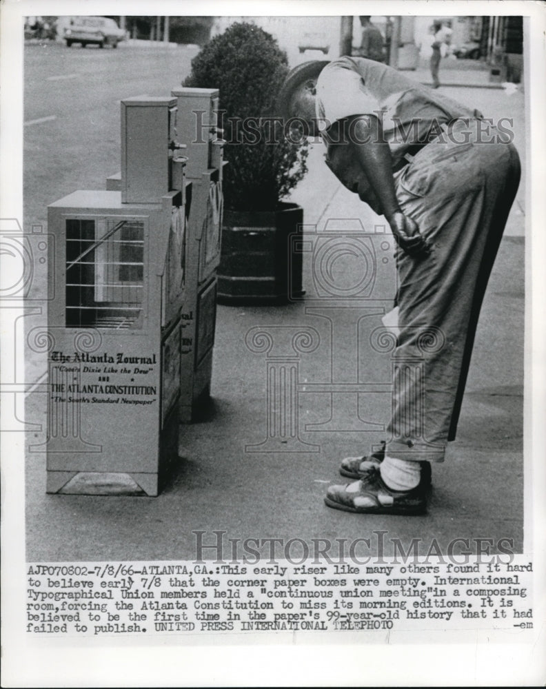 Load image into Gallery viewer, 1966 Press Photo It hard to believe early that the corner paper boxes were empty
