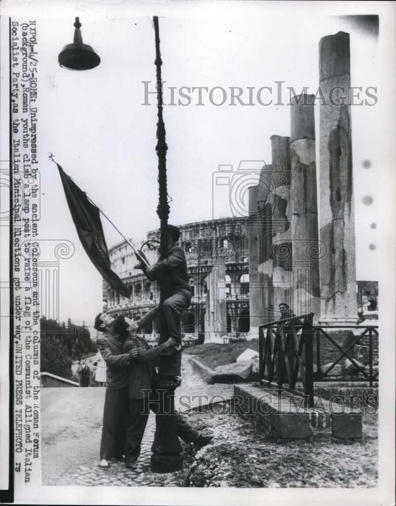 Load image into Gallery viewer, 1956 Press Photo Rome Italy Ancient Colosseum &amp; protestors with communist flag
