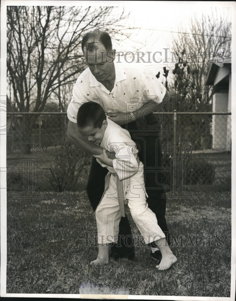 Load image into Gallery viewer, 1962 Press Photo Army Capt James Burke &amp; son Edd Judo training
