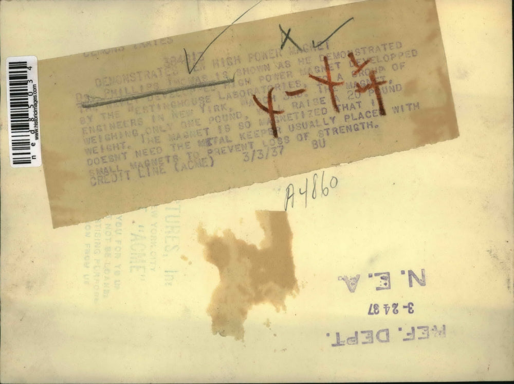 1937 Press Photo Dr. Phillips Thomas Demonstrating High Powered Magnet Developed