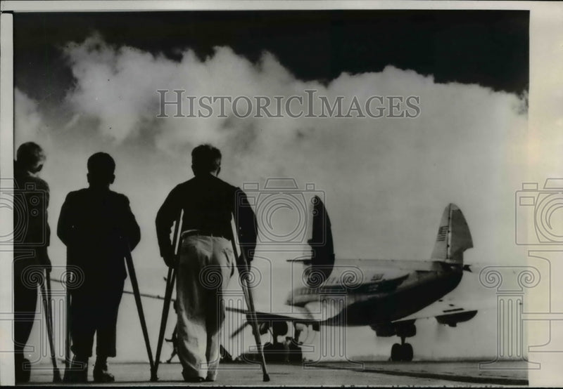 Load image into Gallery viewer, 1950 Press Photo Disabled kids left due to limited capacity watch plane leave
