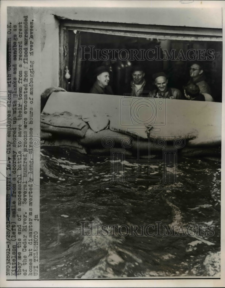 1961 Press Photo Iowa City employees along with K Kittleson smile from doorway