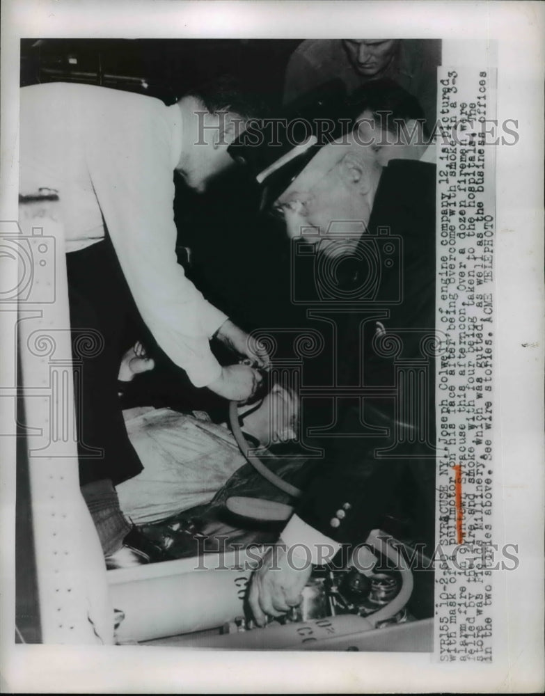 1950 Press Photo Joseph Colwell with the pull motor mask after the fire