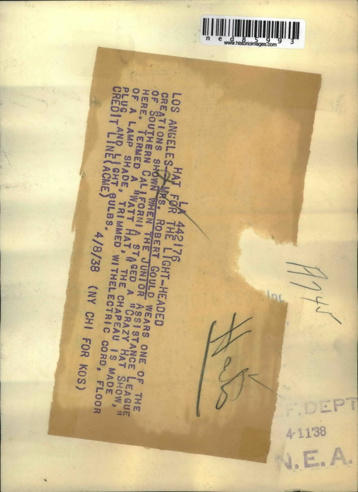 1938 Press Photo Mrs Robert Gould in Lamp Shade Hat Crazy Hat Show Los Angeles