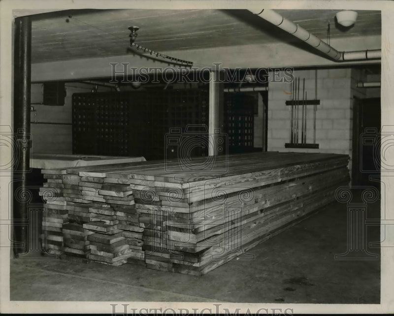 Load image into Gallery viewer, 1950 Press Photo Cleveland Ohio lumber stockpiled at Brooklyn City Hall
