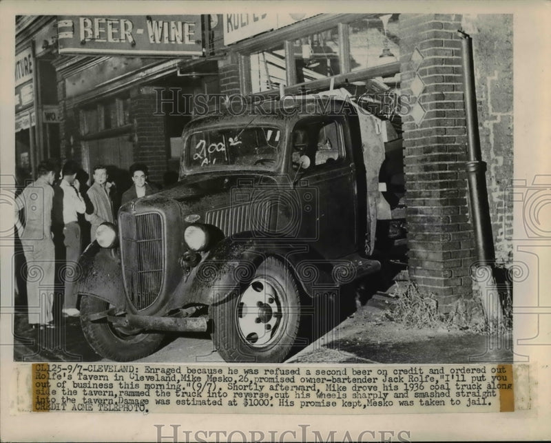 Load image into Gallery viewer, 1949 Press Photo Mike Mesko Drives Angrily into Bar
