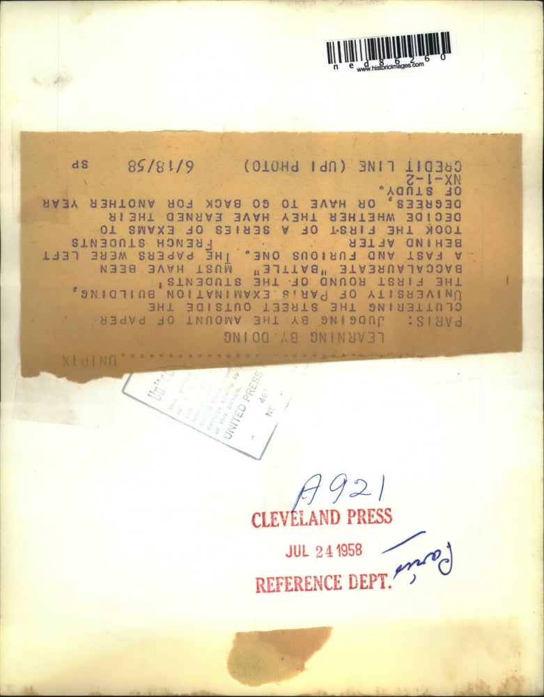 1958 Press Photo Papers Left in Street Outside University of Paris Exam Building