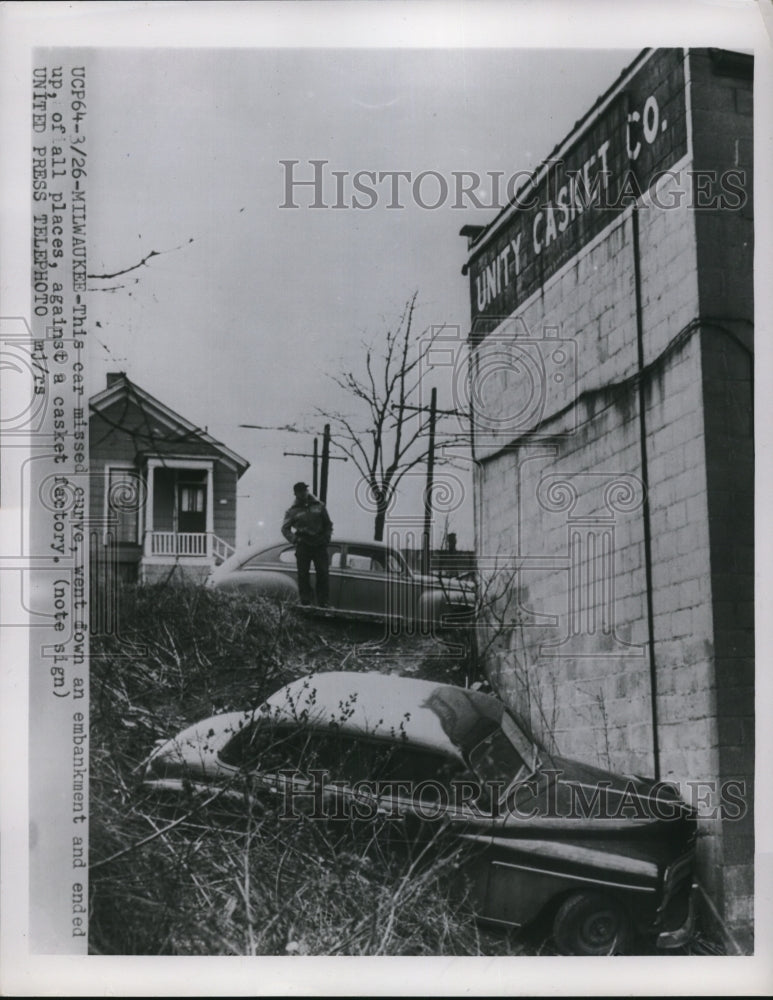 1954 Press Photo Car missed curve and ended at a casket factory