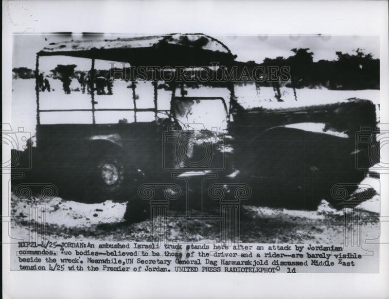 Load image into Gallery viewer, 1956 Press Photo Wreckage of an ambushed Israeli truck by Jordanian Commandos
