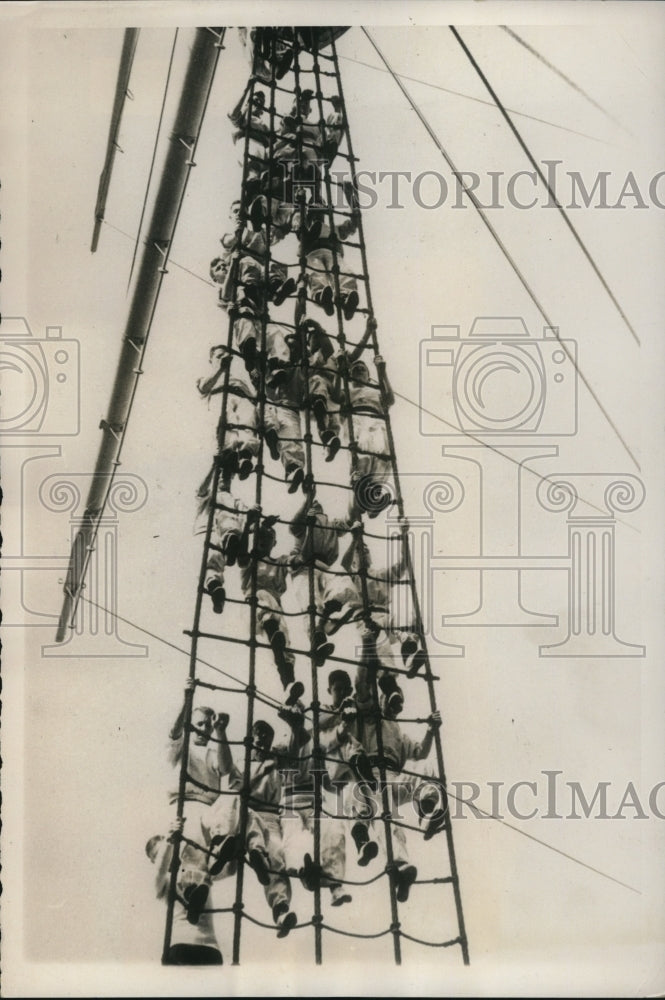 1939 Press Photo of British sailors performing climbing drills.