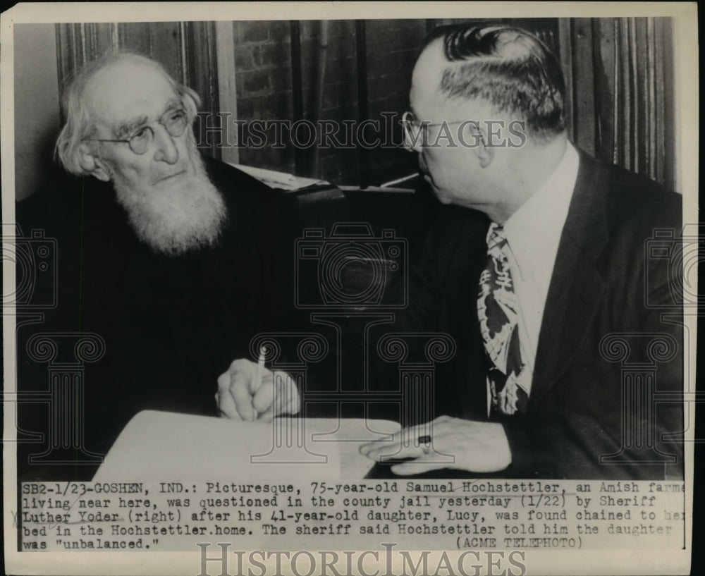 1948 Press Photo Farmer, Samuel Hochstettler being questioned in the county jail