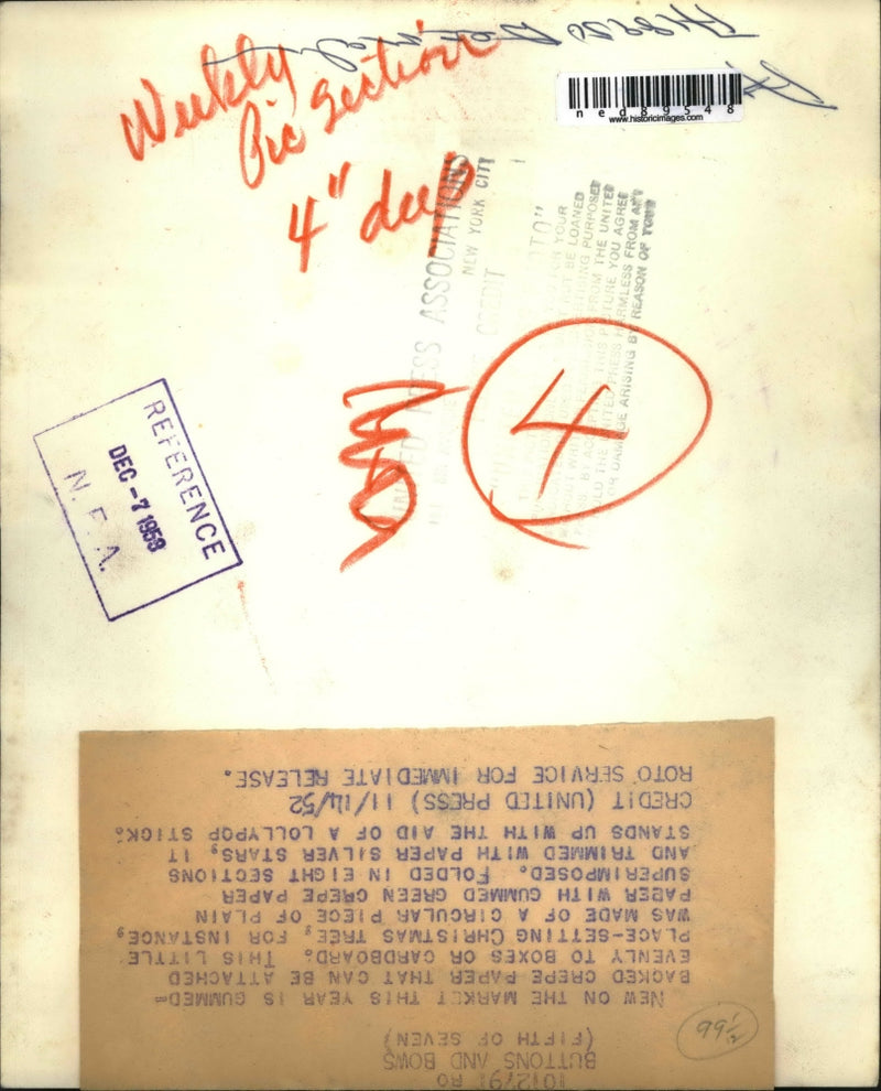 Load image into Gallery viewer, 1952 Press Photo of name tag for a Christmas present.
