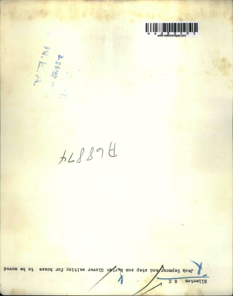 1952 Press Photo Jack Seymour and stepson Martin Glover standing with the dog