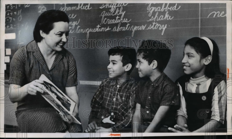 Load image into Gallery viewer, 1964 Press Photo Pupils at Tremont School w/ Mrs.Consuelo Hernandez
