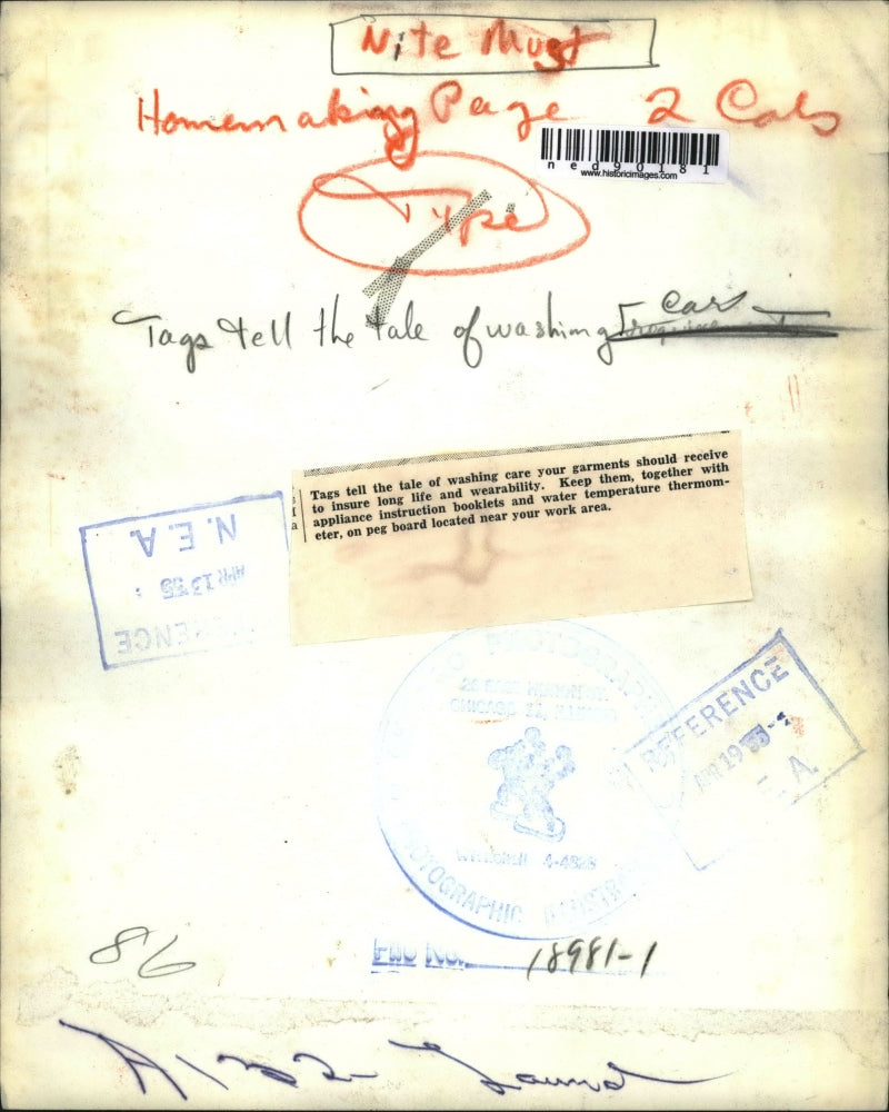 1955 Press Photo Tags tell the tale of Washing