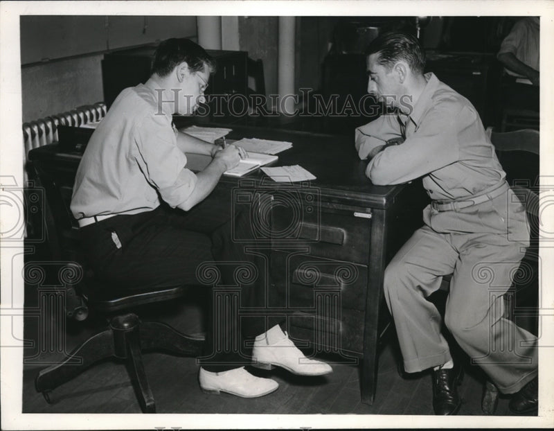 Load image into Gallery viewer, 1945 Press Photo of Anthony Oronzo (R) looking for a job after his military
