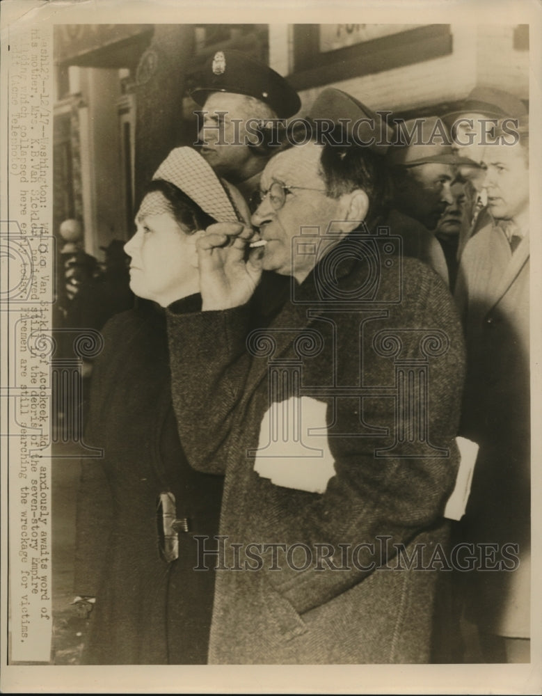 Load image into Gallery viewer, 1948 Press Photo of William Van Sickler waiting to see if rescue personnel find
