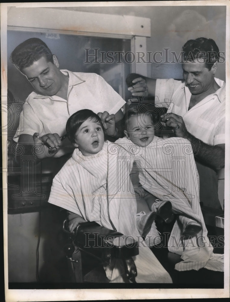 1956 Press Photo of Joe LoSchiavo (L) and Fred getting their haircut their great