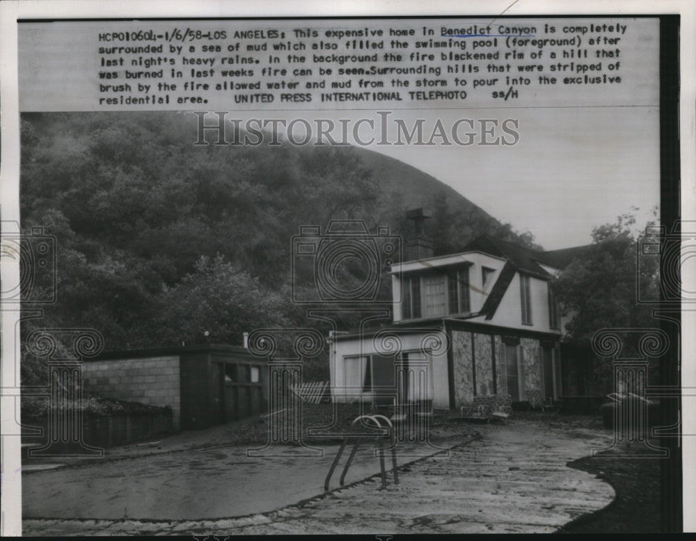 1958 Press Photo of home that was caught in mudslide in Benedict Canyon.