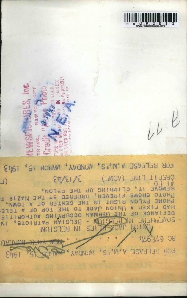 1943 Press Photo of tower in Belgium during WWII with a Union Jack on top.