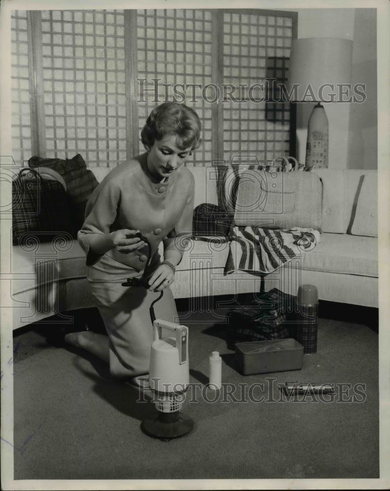 Load image into Gallery viewer, 1959 Press Photo Housewife with 9-Pound Washing Machine

