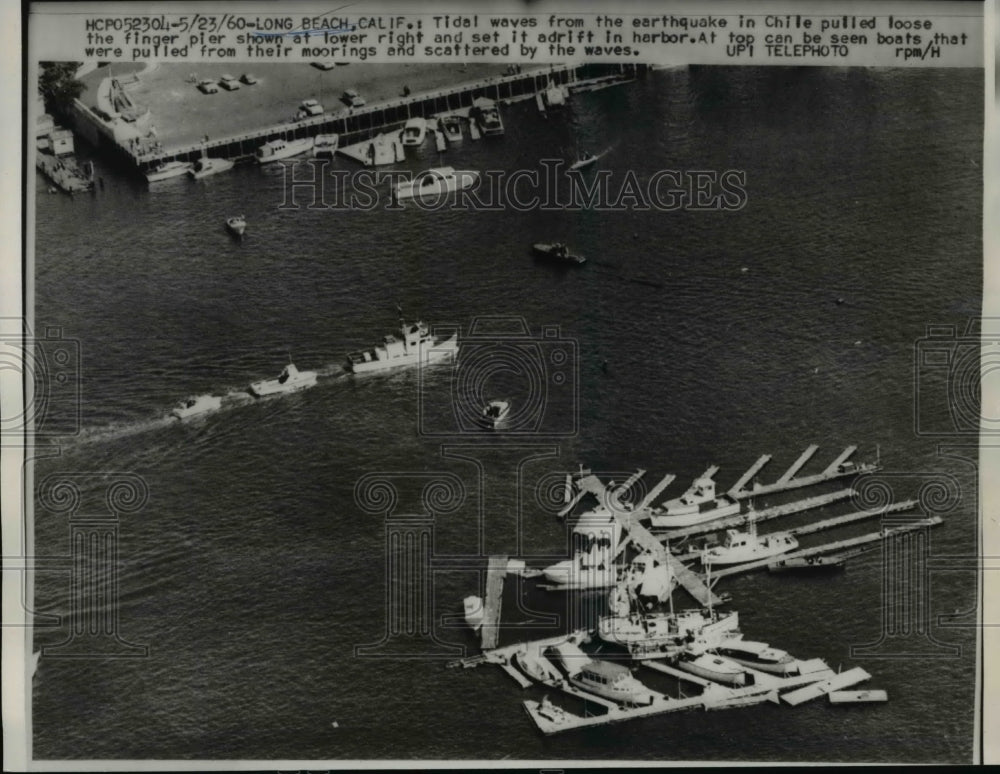 1960 Press Photo Long Beach Calif air view of boats pulled from mooring by waves- Historic Images