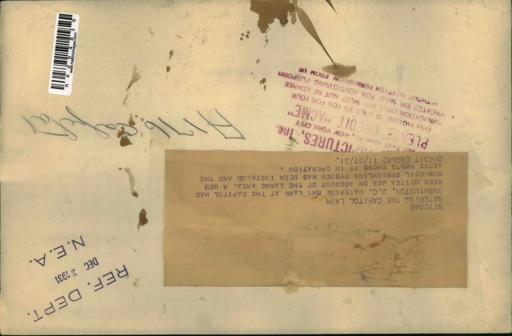 1931 Press Photo Watering the lawn of the Capital Building - ned94836