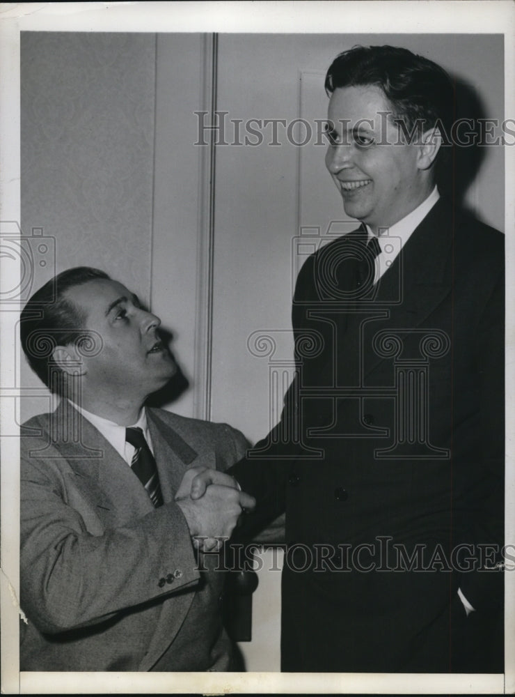 1945 Press Photo Senator Hugh B. Mitchell congratulated by Sen Warren G Magnuson