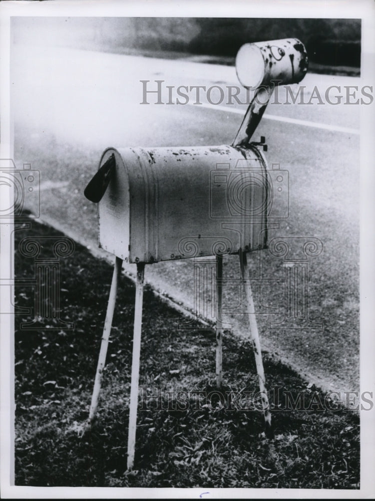 1960 Press Photo A mailbox on stilts made from old cans