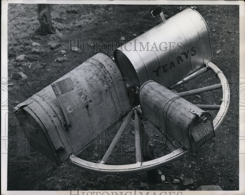 1950 Press Photo An original trio of mailboxes on a wagon wheel