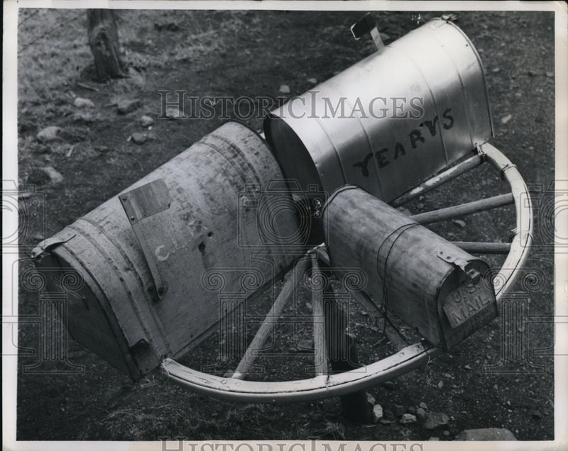 Load image into Gallery viewer, 1950 Press Photo An original trio of mailboxes on a wagon wheel
