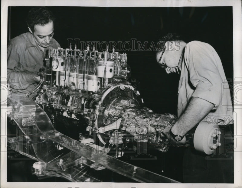 Load image into Gallery viewer, 1951 Press Photo Detorit MichPlymouth Motor Corp techs &amp; plastic engine model
