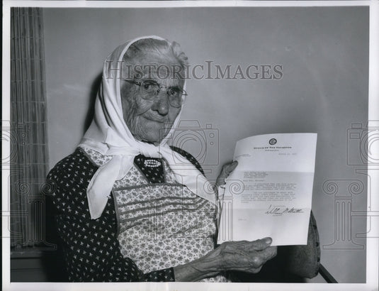 1958 Press Photo Marie Poburka,100, holds a birthday greeting letter
