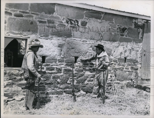 1961 Press Photo Two guys pictured at a historic place one afternoon