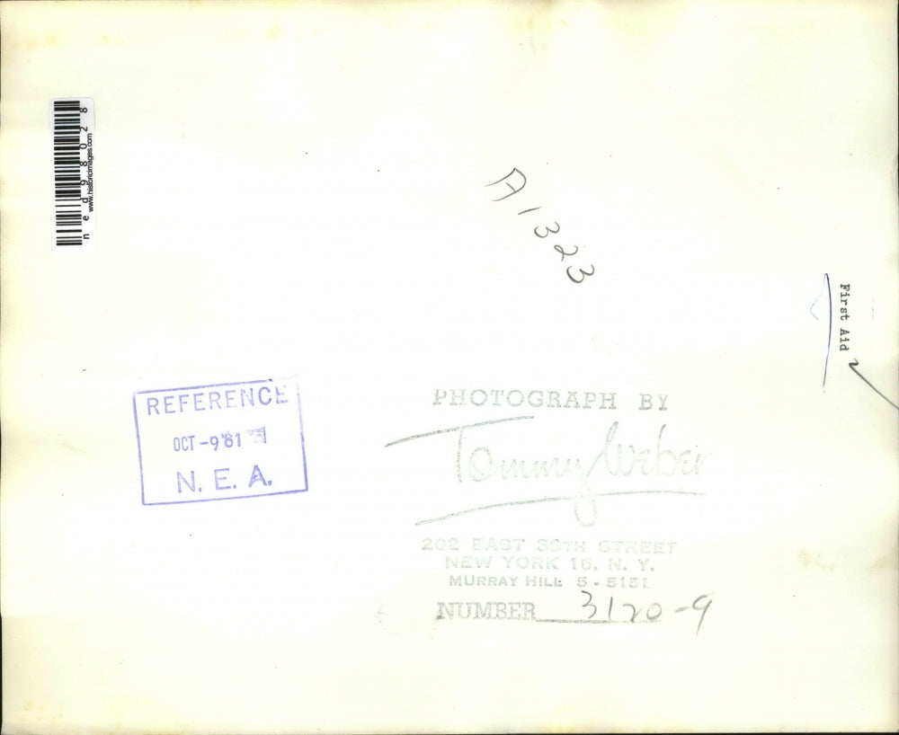 1961 Press Photo A woman & daughter with a home first aid kit