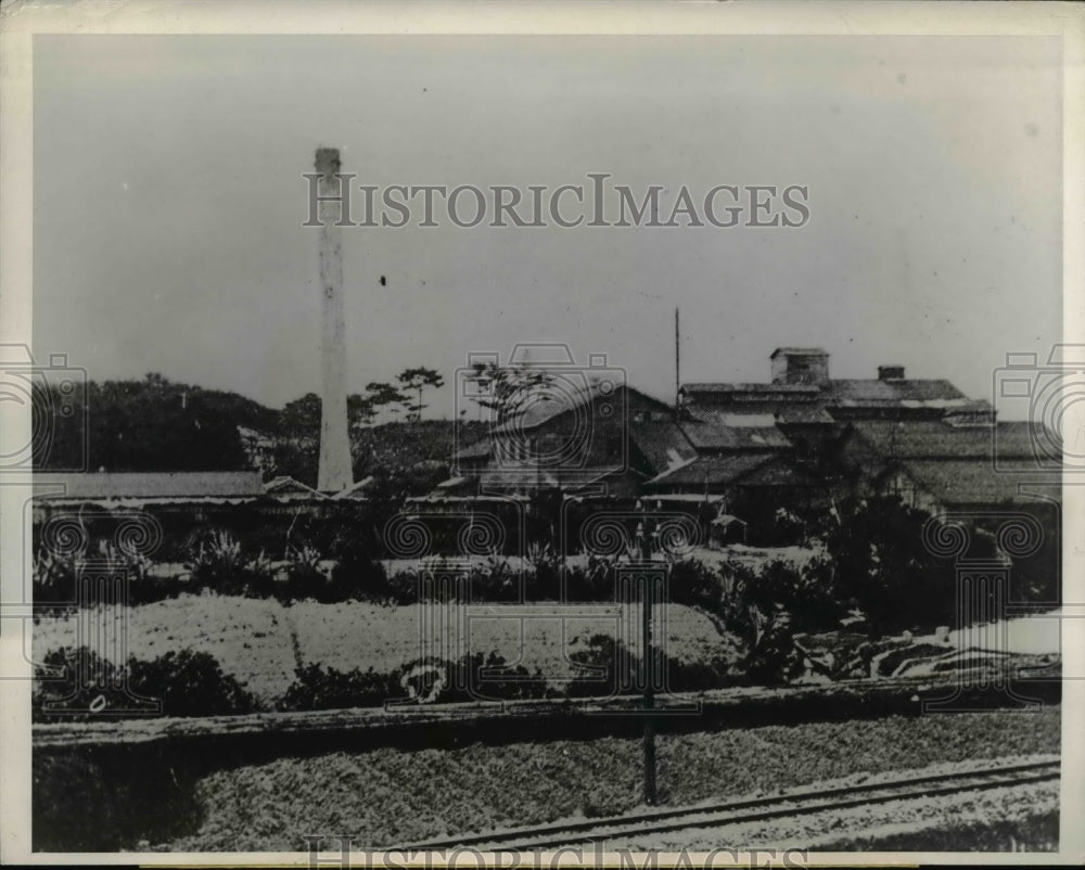 1945 Press Photo Sugar factory in Okinawa Island Artillery Observatory on top