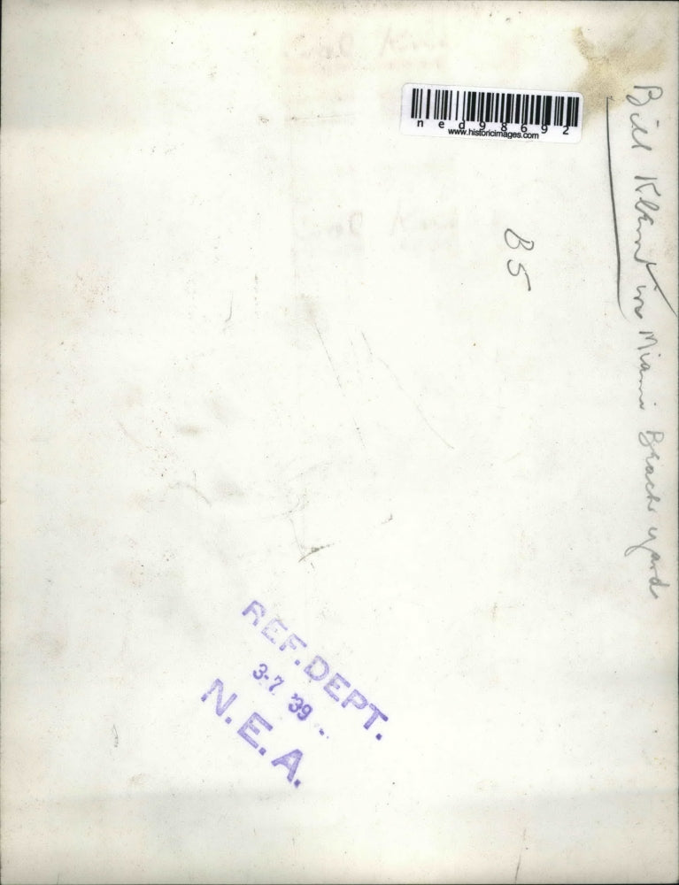 1939 Press Photo Bill Klein in Miami Beach Fla at a palm tree in garden