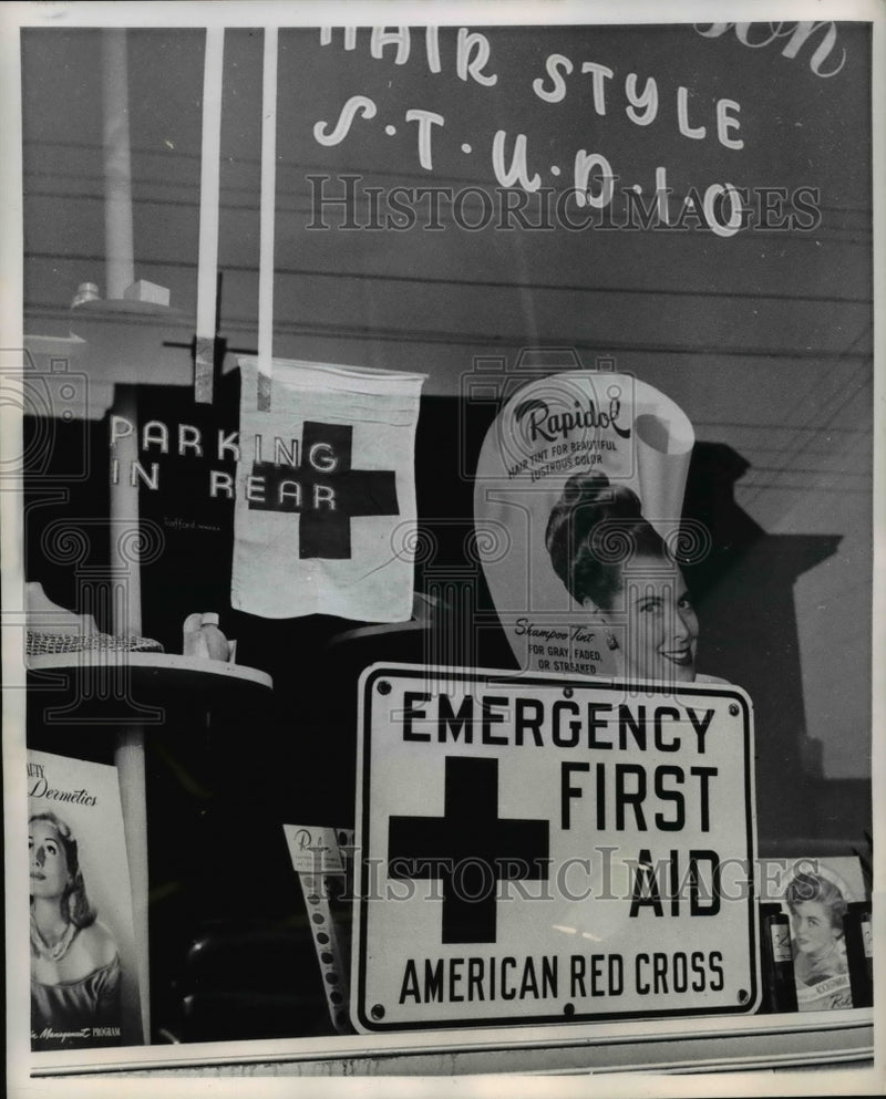 Load image into Gallery viewer, 1951 Press Photo American Cross Emergency First Aid Sign Beauty Shop Long Island
