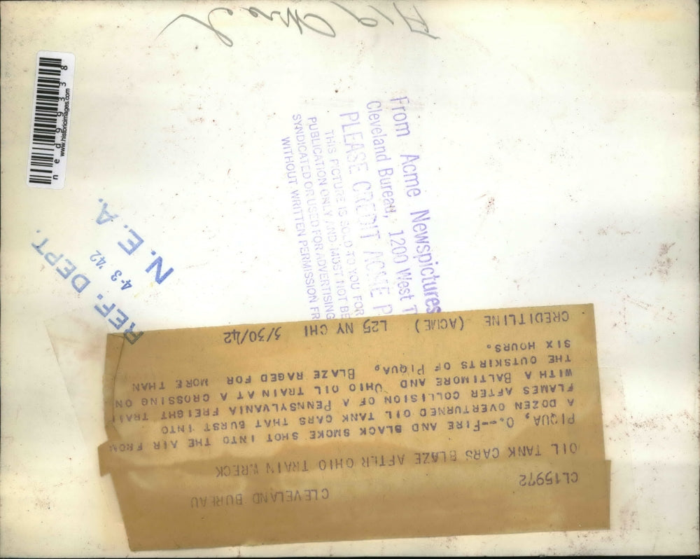 1942 Press Photo Overturned oil tank cars in flames after collision of train