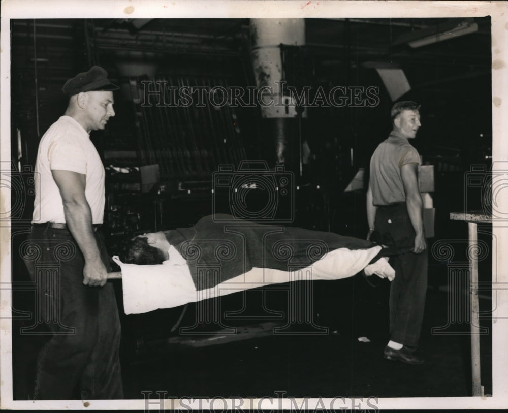 1951 Press Photo Cleveland Police Rescue Squad Prepares Patient for Trip- Historic Images