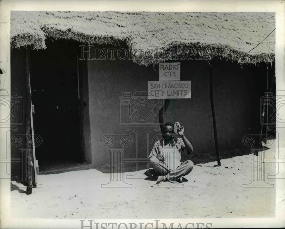 1942 Press Photo Native at co-op somewhere in Africa