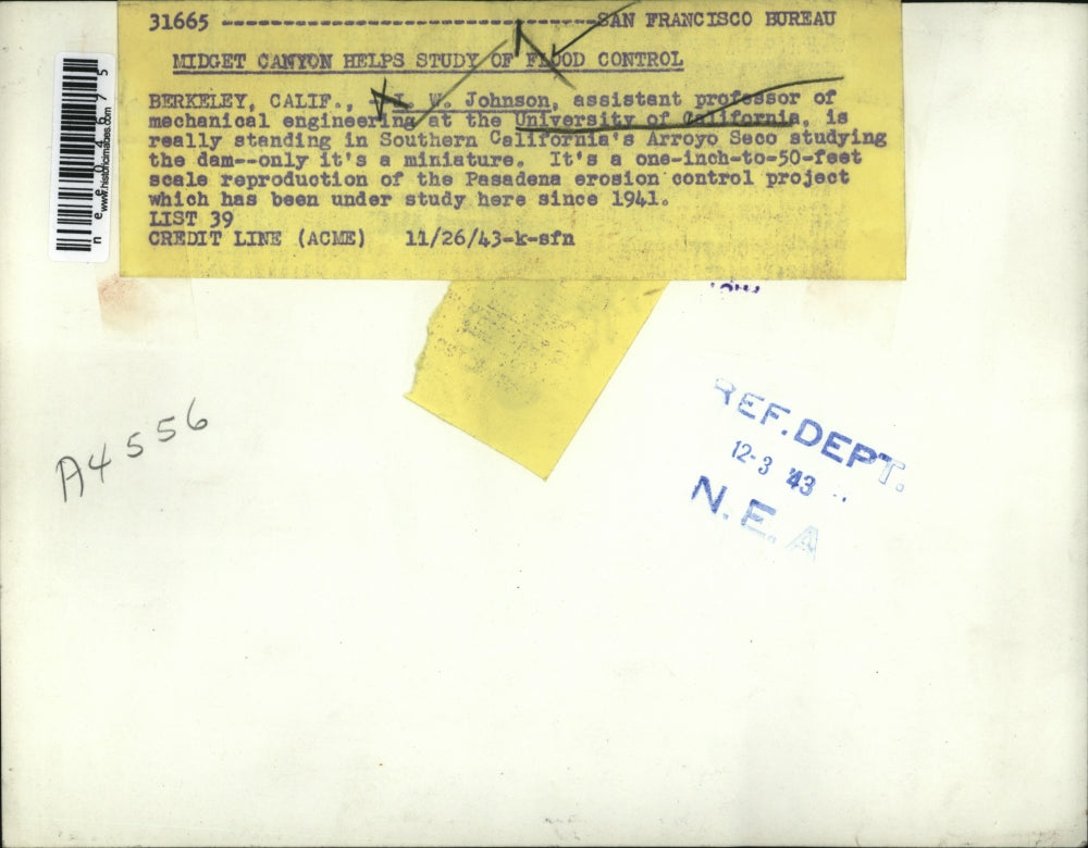 1943 Press Photo of Prof. J.W. Johnson next to a miniature dam. - nee04675