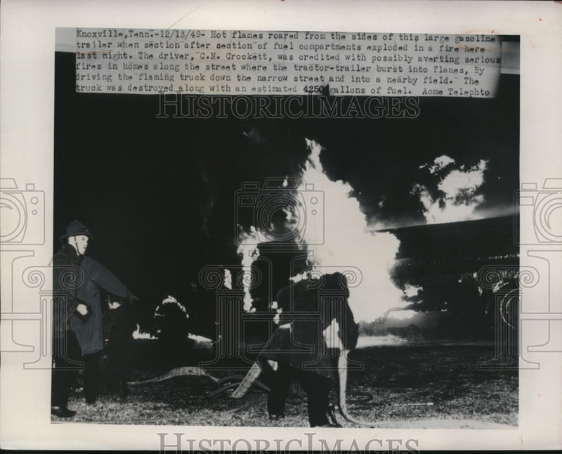 Load image into Gallery viewer, 1949 Press Photo DN Crockett drove a flaming gasoline filled truck away from ppl

