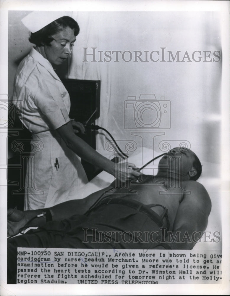 Load image into Gallery viewer, 1955 Press Photo San Diego Calif Archie Moore &amp; nurse Beulah Merchant
